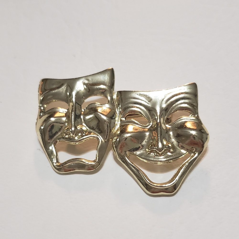 Vintage gold tone theater faces brooch